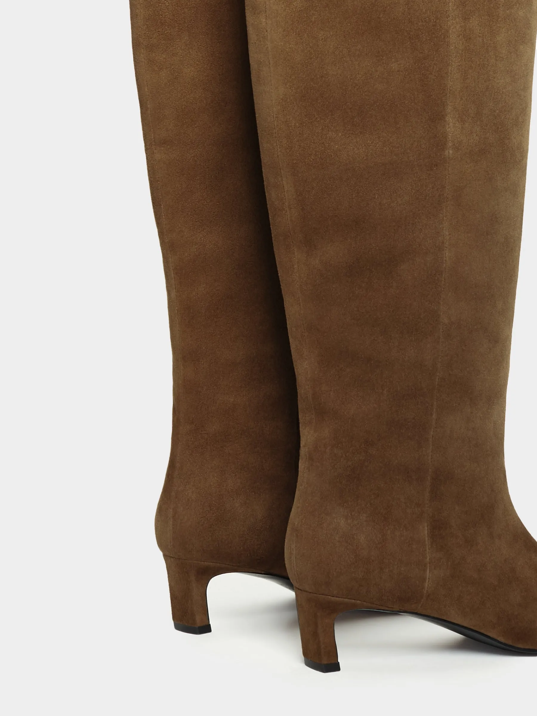 Heeled knee-high boots